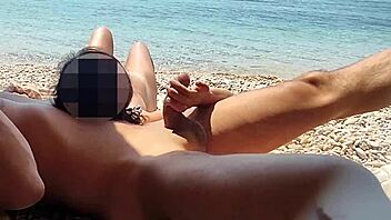 Caught on beach during handjob fun