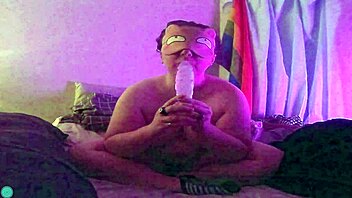 Dildo fellatio on the bed with blindfold and teasing