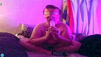Dildo fellatio on the bed with blindfold and teasing