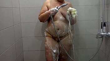 Hairy pussy or shaved cunt vote mature bbw shaves her big pussy and fat thighs and juicy ass and she washes in the shower homemade fetish