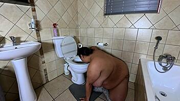 Playing with my fat pussy while licking the toilet