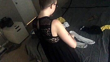 Bald girl ignores you while folding laundry