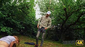 Stretched her hole right in the forest outdoors