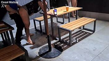 Public food orgy with swinging couple