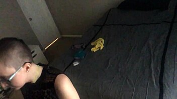 Bald girl ignores you while folding laundry