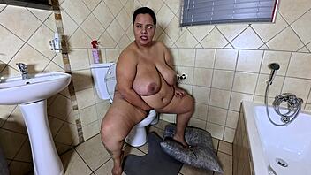 Playing with my fat pussy while licking the toilet