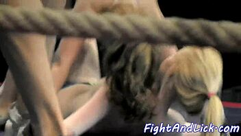Muscular Women Wrestling In A Boxing Ring
