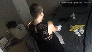 Bald girl ignores you while folding laundry