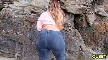 Big ass woman and younger man have incredible sex on the beach