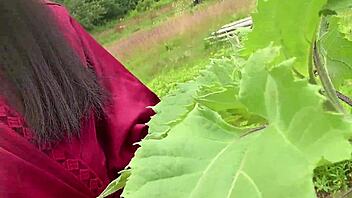 Petite asian babe pisses in garden