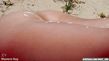 Mia Natalia Takes Cumshot On Public Beach From Western Guy