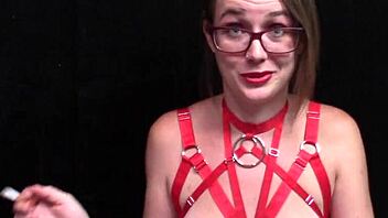 Experience the thrill of smoking a fetish with this tattooed solo female