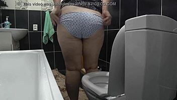 Amateur husband spies on his wife pissing in the toilet and asmr